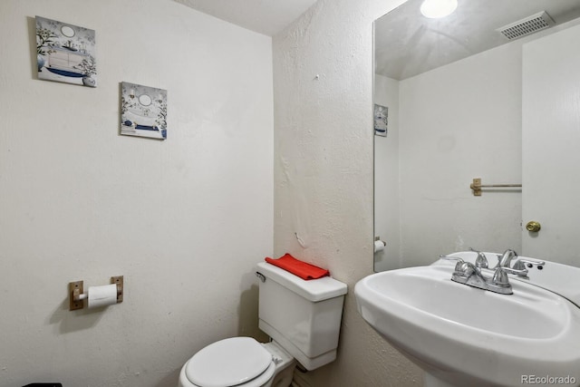 2826 S Lansing Way, Aurora, CO 80014 - half bath with a sink and toilet