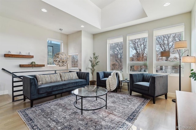 living room with light hardwood / wood-style flooring