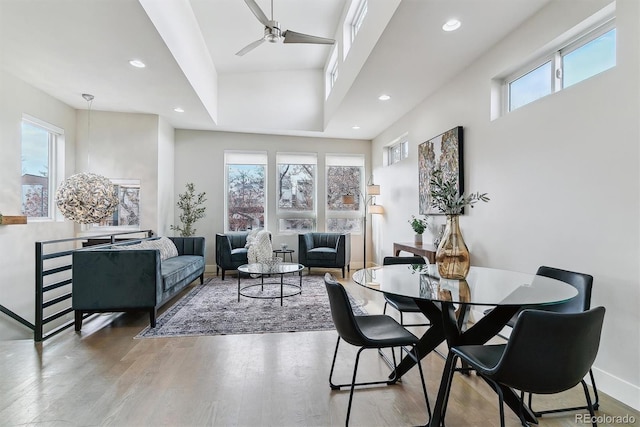 dining area featuring hardwood / wood-style flooring, a wealth of natural light, and ceiling fan