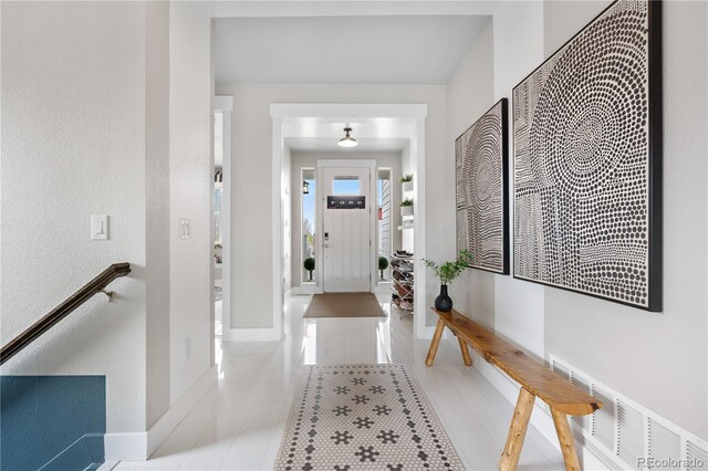198 Calhoun Cir, Castle Rock, CO 80104 - entryway with baseboards and a textured wall