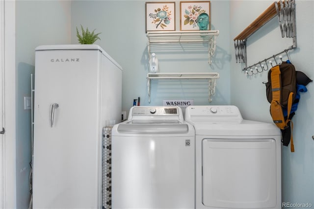 198 Calhoun Cir, Castle Rock, CO 80104 - laundry room with washer and clothes dryer and laundry area