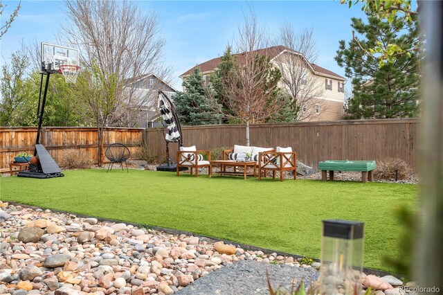 198 Calhoun Cir, Castle Rock, CO 80104 - view of yard with a fenced backyard and an outdoor hangout area