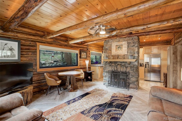 living room with a fireplace, log walls, and light parquet flooring