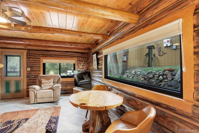 home theater room featuring rustic walls, beamed ceiling, wood ceiling, and parquet flooring