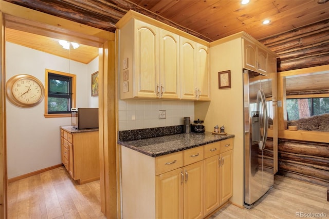 kitchen featuring light brown cabinets, wooden ceiling, stainless steel refrigerator with ice dispenser, light hardwood / wood-style flooring, and dark stone countertops