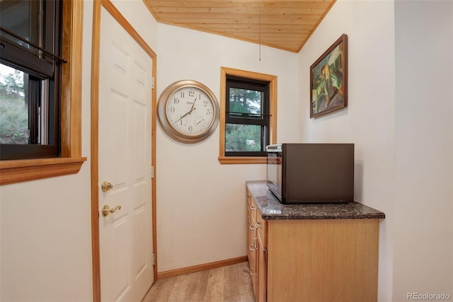 interior space featuring wooden ceiling and light hardwood / wood-style floors