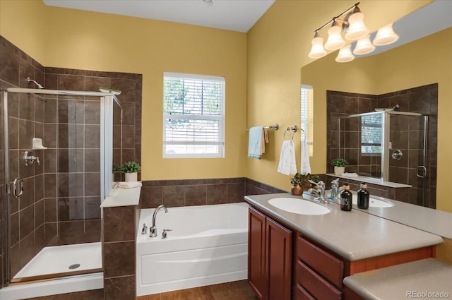 3419 Traver Dr, Broomfield, CO 80023 - bathroom featuring vanity, a bath, and a shower stall