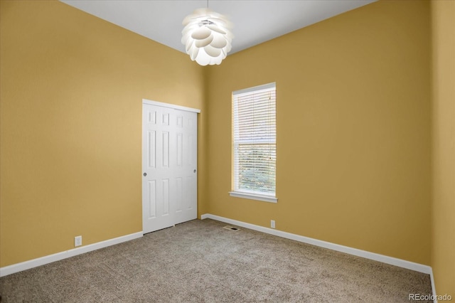 3419 Traver Dr, Broomfield, CO 80023 - spare room with baseboards, visible vents, and carpet