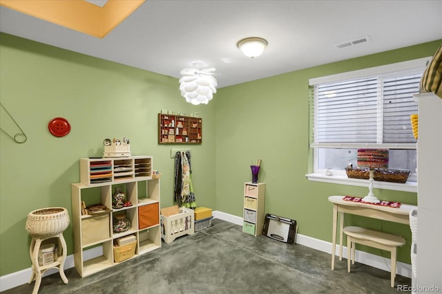 3419 Traver Dr, Broomfield, CO 80023 - game room with baseboards, concrete floors, and visible vents