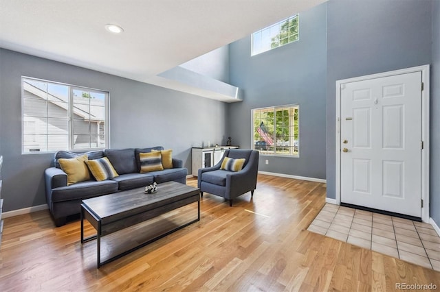 5229 Nighthawk Pkwy, Brighton, CO 80601 - living room with light wood-type flooring, plenty of natural light, and recessed lighting