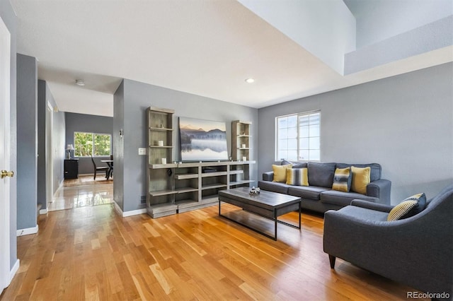 5229 Nighthawk Pkwy, Brighton, CO 80601 - living area featuring light wood-style floors and recessed lighting