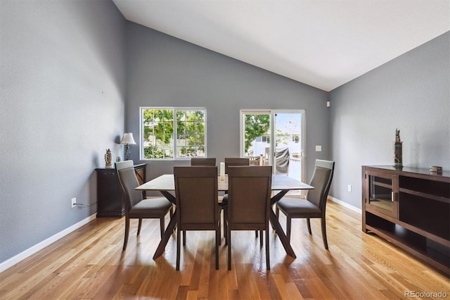 5229 Nighthawk Pkwy, Brighton, CO 80601 - dining area featuring lofted ceiling and light wood-style floors