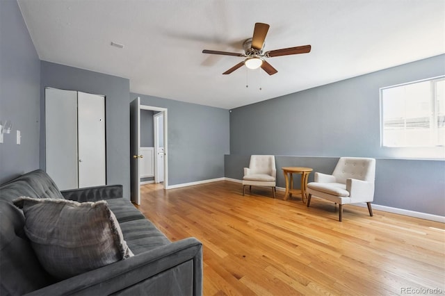 5229 Nighthawk Pkwy, Brighton, CO 80601 - living area featuring wood finished floors and a ceiling fan