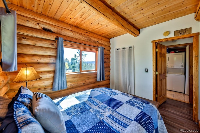 bedroom with dark wood-type flooring, stacked washer / drying machine, wood ceiling, and log walls