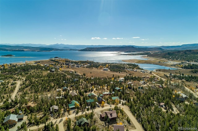 bird's eye view featuring a water and mountain view