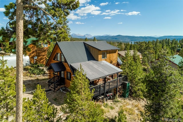 exterior space featuring a mountain view