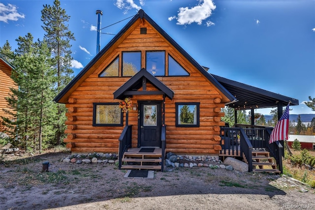 view of log home