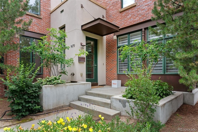 1479 S Clarkson St, Denver, CO 80210 - property entrance with brick siding