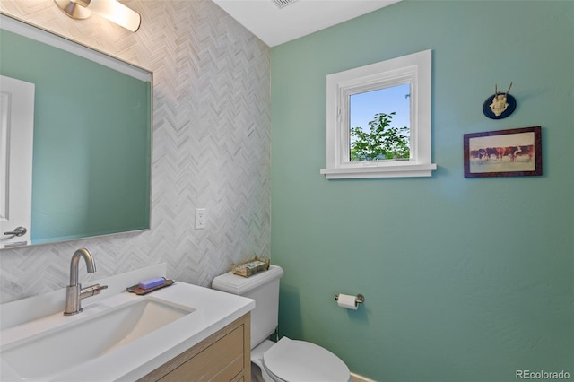 1479 S Clarkson St, Denver, CO 80210 - bathroom featuring toilet and vanity