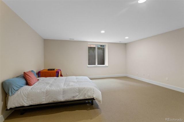1479 S Clarkson St, Denver, CO 80210 - bedroom with light carpet and recessed lighting
