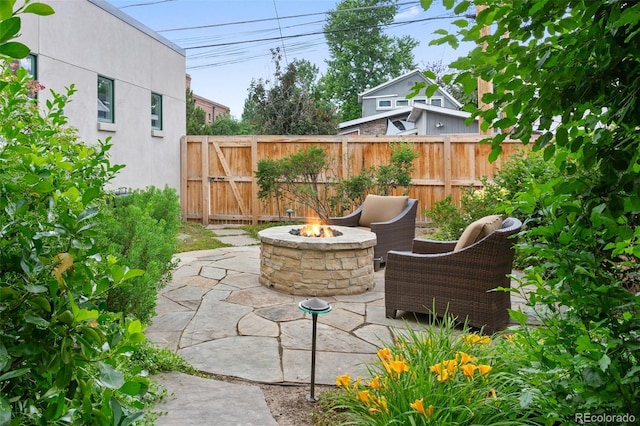 1479 S Clarkson St, Denver, CO 80210 - view of patio / terrace with an outdoor fire pit