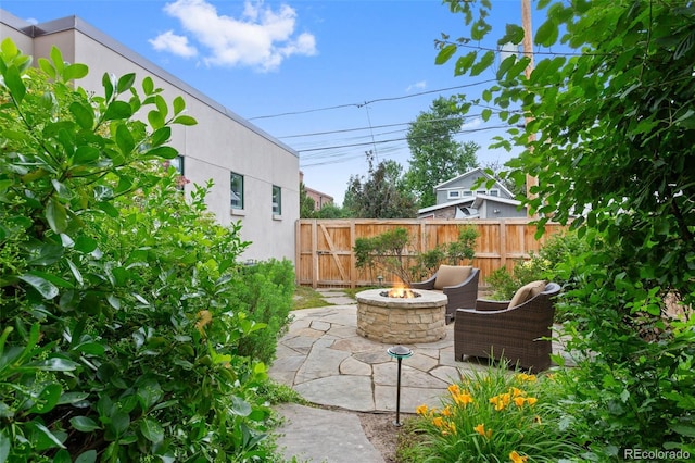 1479 S Clarkson St, Denver, CO 80210 - view of patio featuring a fire pit