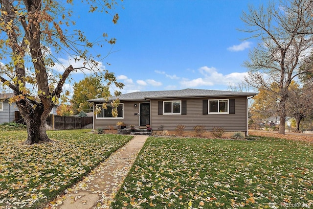 ranch-style house featuring a front lawn