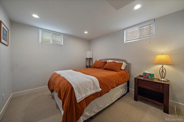 bedroom with light colored carpet