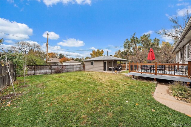 view of yard with a patio and a deck