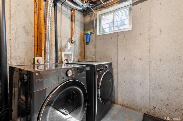 6730 W 84th Cir Unit 96, Arvada, CO 80003 - laundry area with washing machine and dryer and laundry area