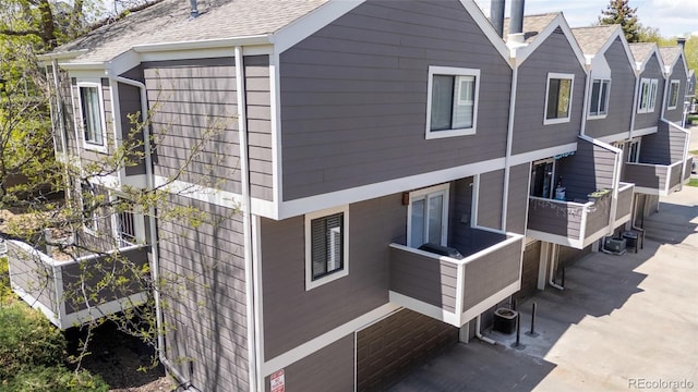 6730 W 84th Cir Unit 96, Arvada, CO 80003 - view of side of property featuring cooling unit