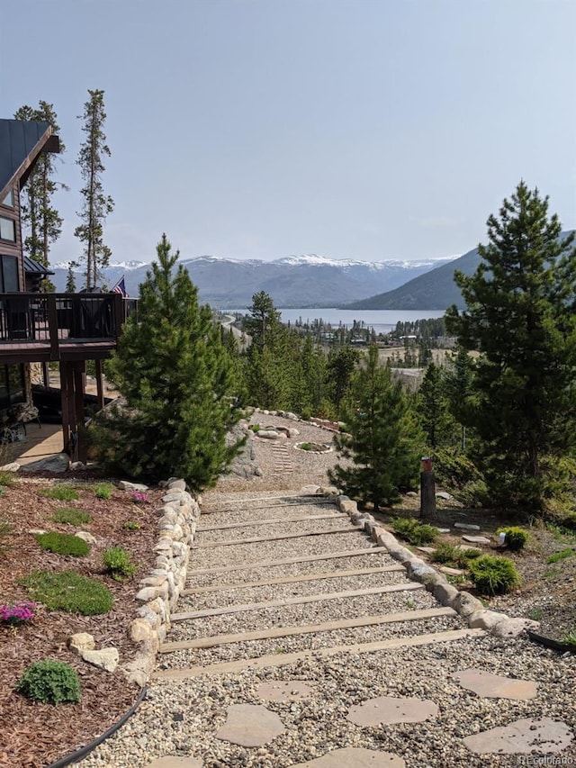 114 Gcr 4624, Grand Lake, CO 80447 - view of home's community featuring a deck with mountain view and stairs