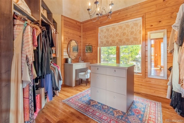 114 Gcr 4624, Grand Lake, CO 80447 - walk in closet featuring a chandelier and light wood-type flooring