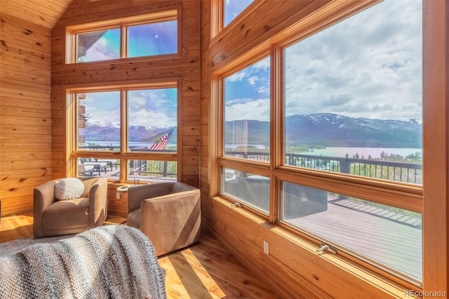 114 Gcr 4624, Grand Lake, CO 80447 - sunroom / solarium with plenty of natural light, lofted ceiling, and a water and mountain view
