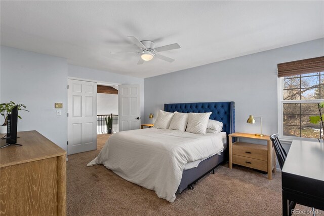 carpeted bedroom featuring a ceiling fan