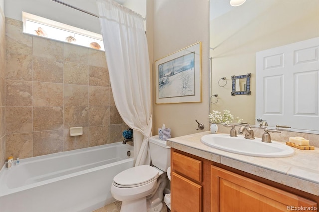 bathroom with vanity, shower / bath combo with shower curtain, and toilet