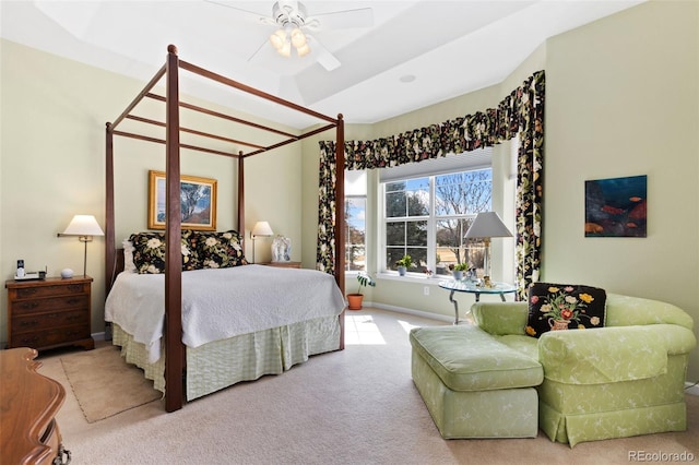 carpeted bedroom featuring baseboards