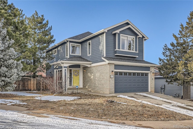 view of front of property with a garage