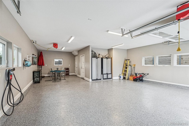 garage featuring baseboards