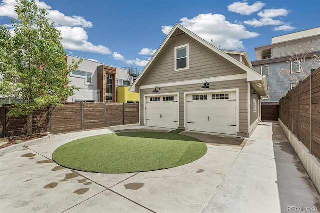 garage featuring fence