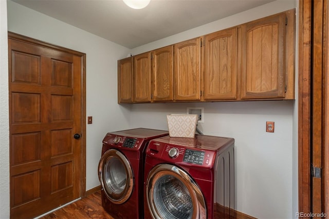 laundry area with washer and dryer, baseboards, dark wood-style floors, and cabinet space