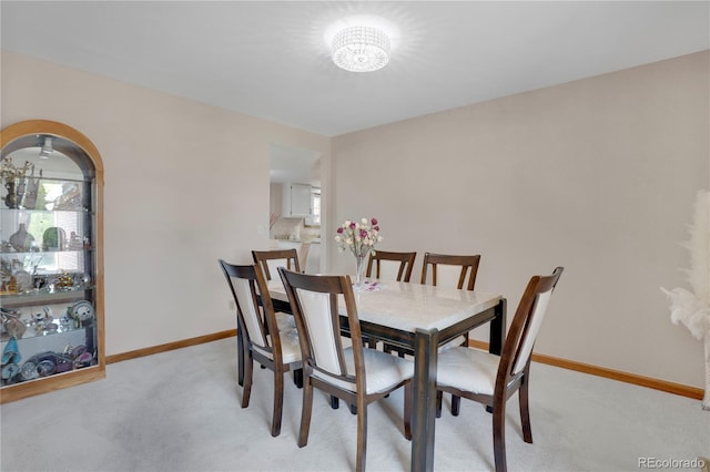 5603 S Pagosa Ct, Centennial, CO 80015 - dining area with baseboards and light carpet