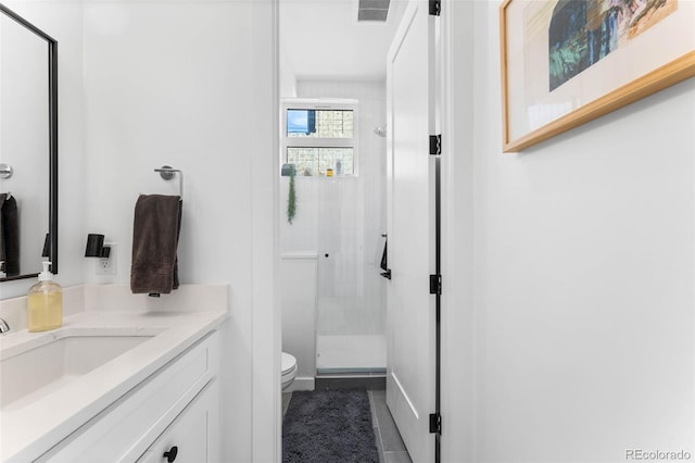 1232 N Yates St Unit 3, Denver, CO 80204 - bathroom featuring a stall shower, vanity, and tile patterned floors