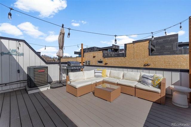 1232 N Yates St Unit 3, Denver, CO 80204 - wooden terrace featuring an outdoor living space and grilling area