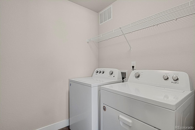 laundry area featuring washer and dryer