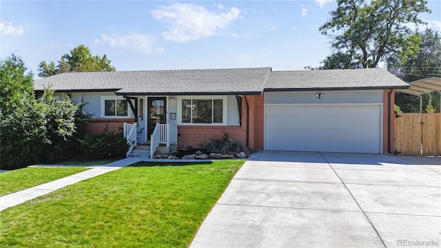 ranch-style house with a garage and a front lawn