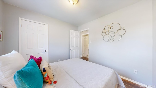 bedroom featuring wood-type flooring