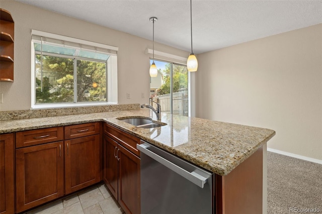 18171 E Arizona Ave Unit B, Aurora, CO 80017 - kitchen featuring dishwasher, a sink, a peninsula, and light stone countertops