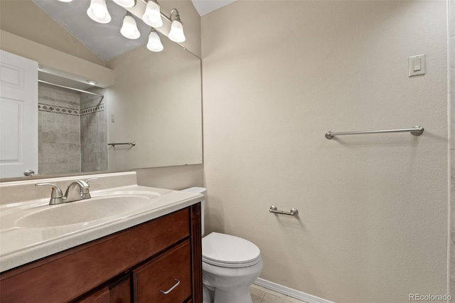 18171 E Arizona Ave Unit B, Aurora, CO 80017 - full bathroom with toilet, vanity, tile patterned flooring, a shower, and vaulted ceiling