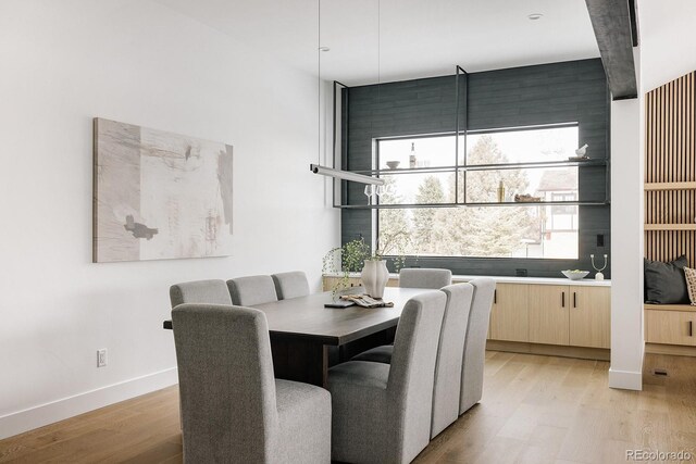 dining space featuring light hardwood / wood-style floors